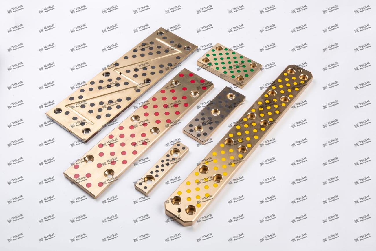 High-strength brass inlaid graphite wear-resistant plate